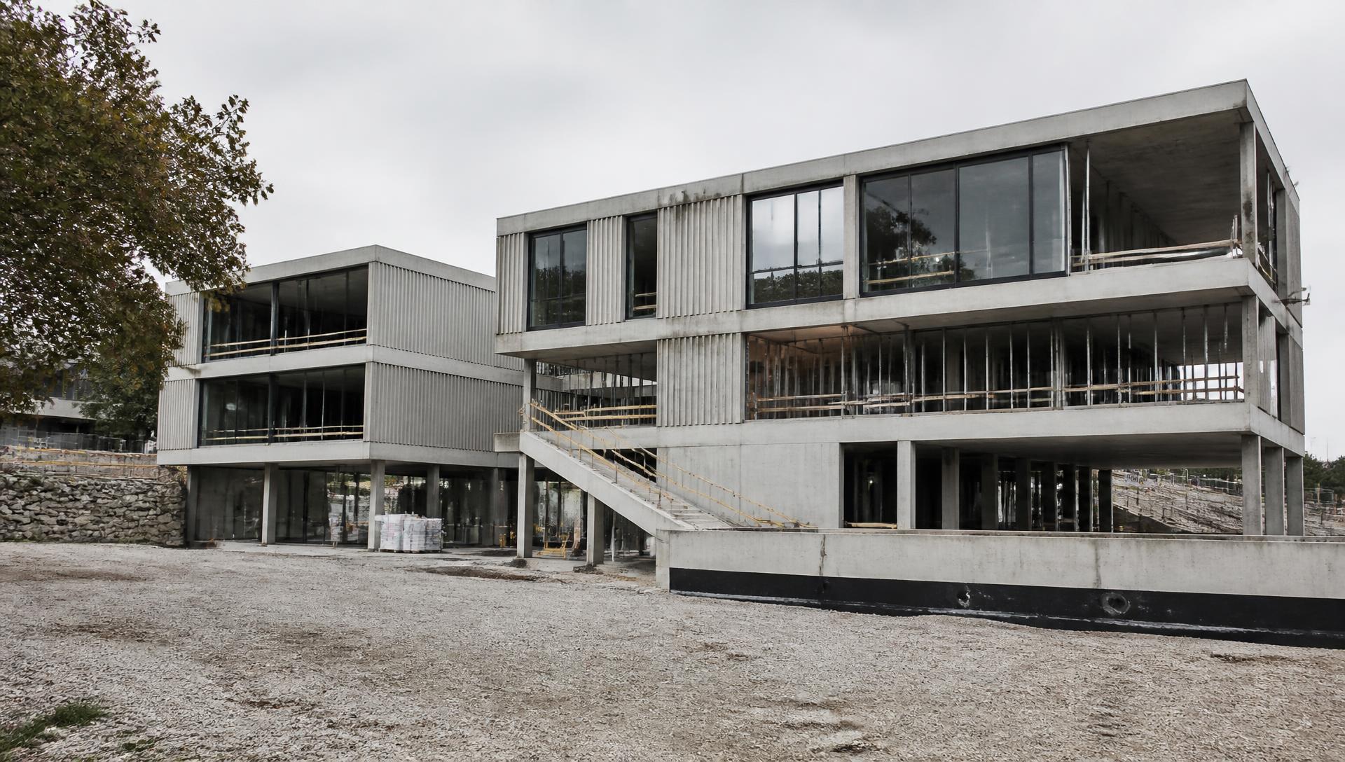 Concrete and glass residential building under construction
